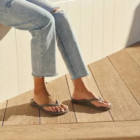 Archies arch support flip flops in grey, worn with cropped jeans