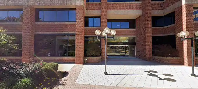 Brick office-building entrance at the Reston clinic location