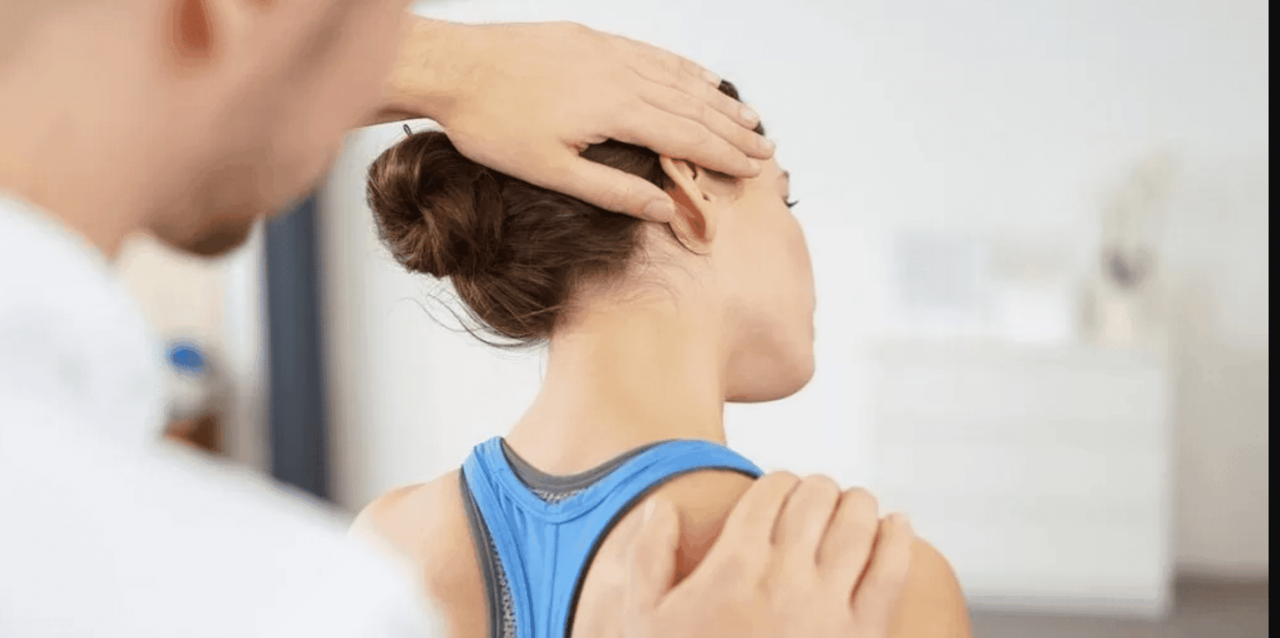 Female physical therapist performing hands-on pelvic floor and manual therapy with a patient during a menopause physical therapy session at Fusion Rehab and Wellness in Alexandria, VA