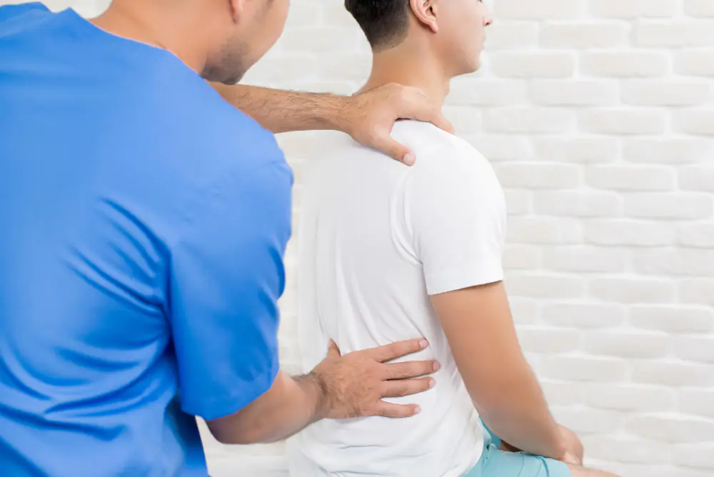 Woman engaged in a guided pelvic floor therapy exercise session with a physical therapist at Fusion Rehab and Wellness in Falmouth, VA