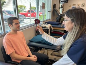Patient working with a provider at a geriatric physical therapy clinic in Fredericksburg, V